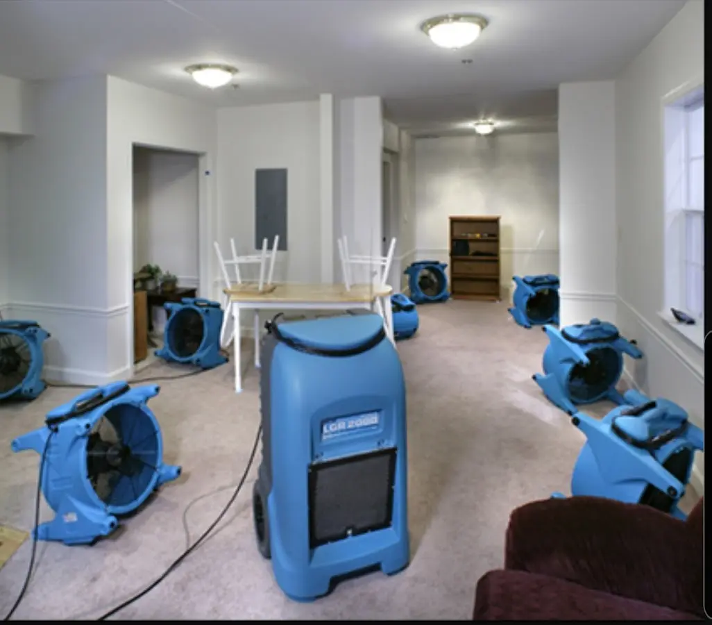 Air movers and dehumidifier setup for Water Extraction & Removal in Grambling